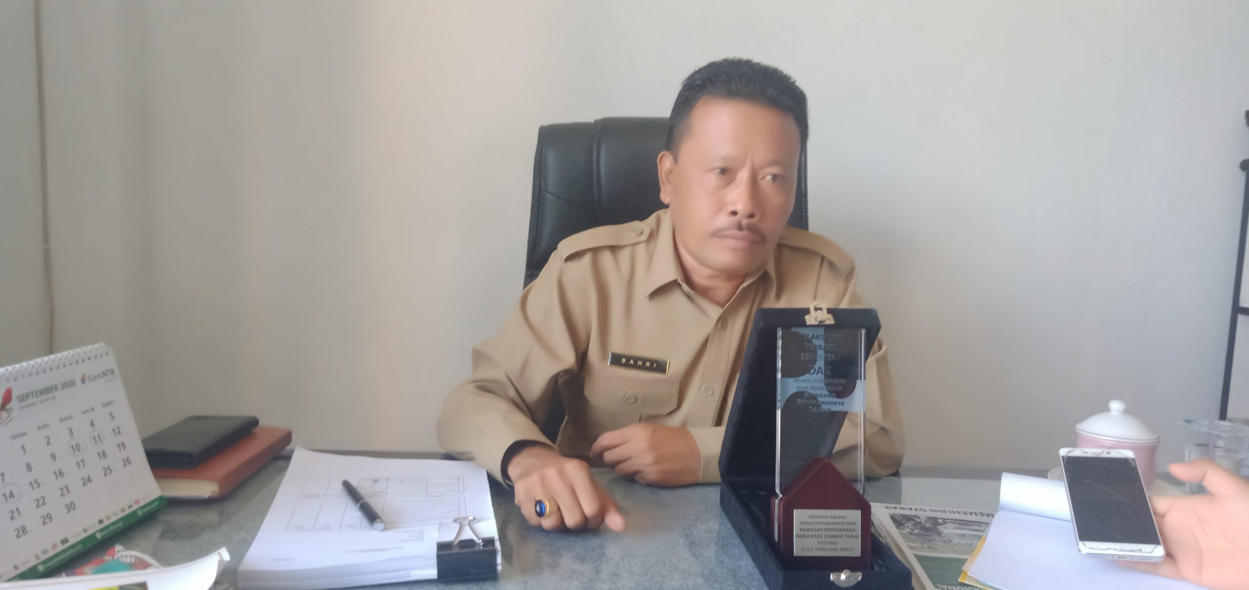 Penanganan RTLH Tercepat, Dinas Perkim Lotim Dianugerahi Penghargaan